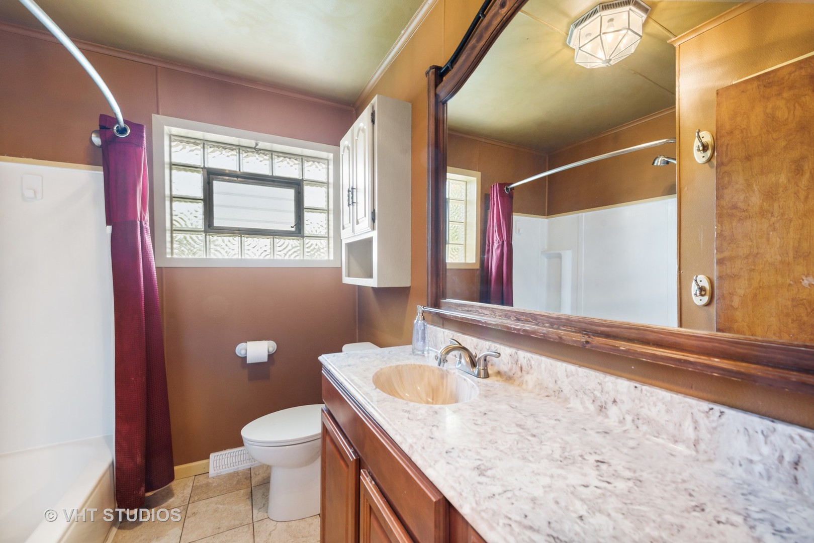 40 Pine Tree Row Lake Zurich, IL 60047 - Photo 10 of 22 a bathroom with a granite countertop sink toilet and large mirror