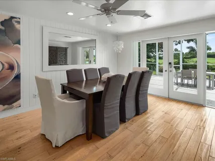 a view of a livingroom with furniture and wooden floor