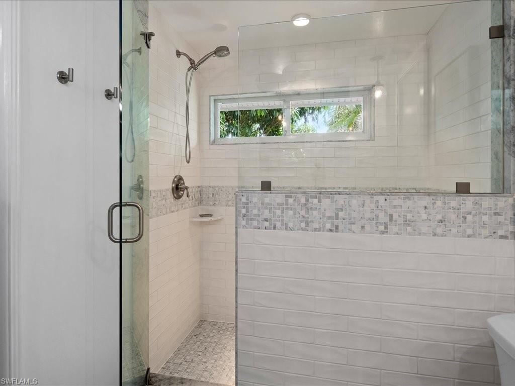 436 Golfview Drive Naples, FL 34110 - Photo 24 of 44 a bathroom with a shower
