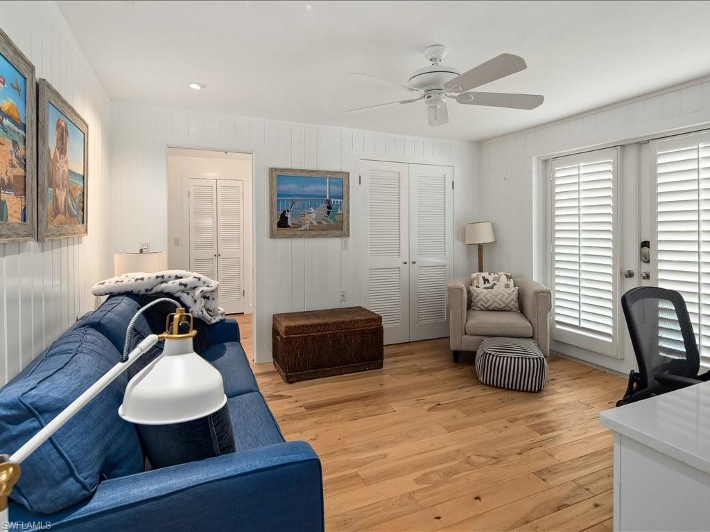 436 Golfview Drive Naples, FL 34110 - Photo 26 of 44 a living room with furniture and a window