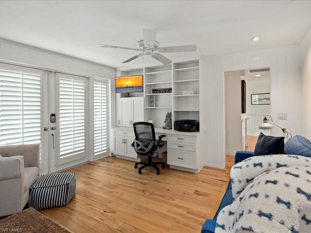 436 Golfview Drive Naples, FL 34110 - Photo 27 of 44 a view of a livingroom with workspace and a window