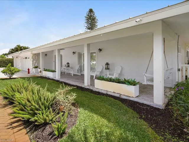 a view of swimming pool with a yard