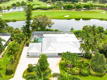 a view of a lake with a big yard