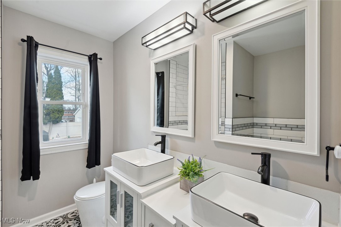 1907 Wrenford Road Cleveland, OH 44121 - Photo 17 of 34 Main Level Full Bathroom