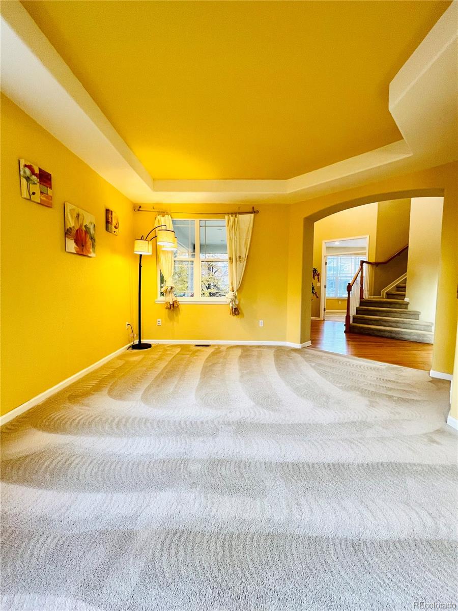 16866 East Peakview Avenue Aurora, CO 80016 - Photo 13 of 27 a view of empty room with a patio