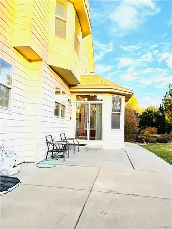 a front view of a house with patio