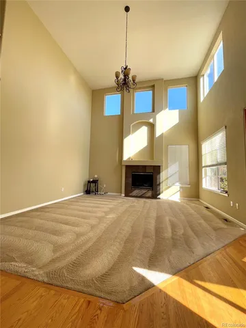 a bedroom with a bed and a fireplace