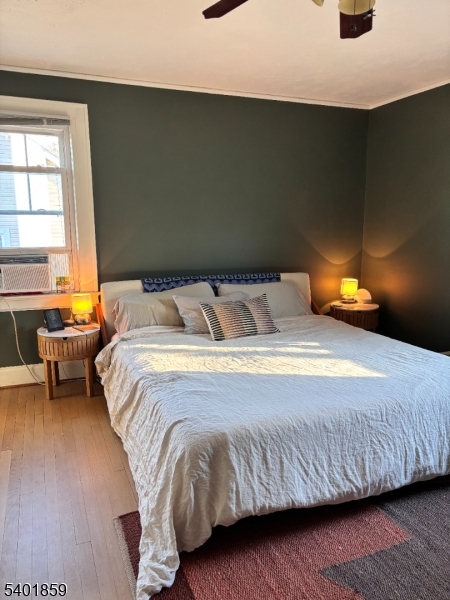 61 Luddington Road West Orange, NJ 07052 - Photo 11 of 25 a bedroom with a bed and window