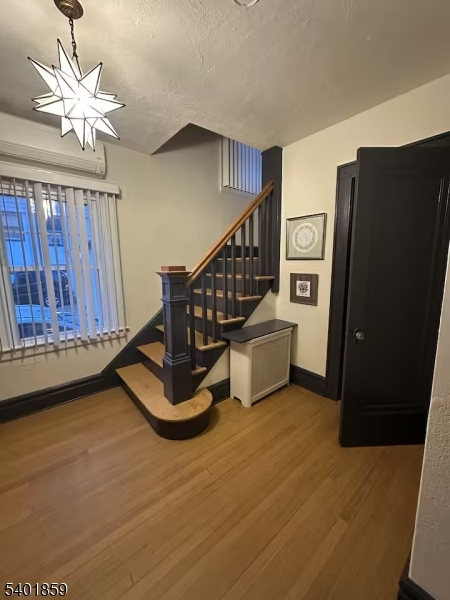 61 Luddington Road West Orange, NJ 07052 - Photo 2 of 25 a view of a livingroom with furniture and staircase