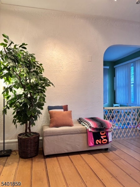 61 Luddington Road West Orange, NJ 07052 - Photo 4 of 25 a living room with furniture and flowers