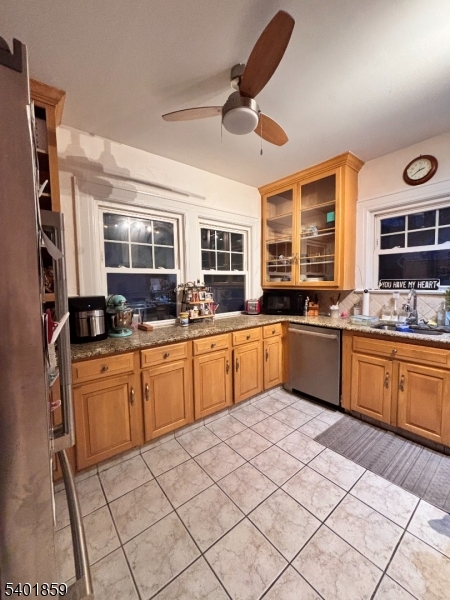 61 Luddington Road West Orange, NJ 07052 - Photo 10 of 25 a large kitchen with stainless steel appliances granite countertop a stove sink and cabinets