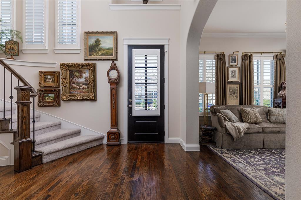 2500 Addison Street McKinney, TX 75071 - Photo 3 of 33 Welcoming foyer flanked by a library and spiral staircase
