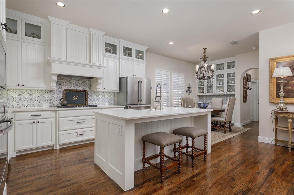 2500 Addison Street McKinney, TX 75071 - Photo 9 of 33 Kitchen is light and bright. Updated in 2024.