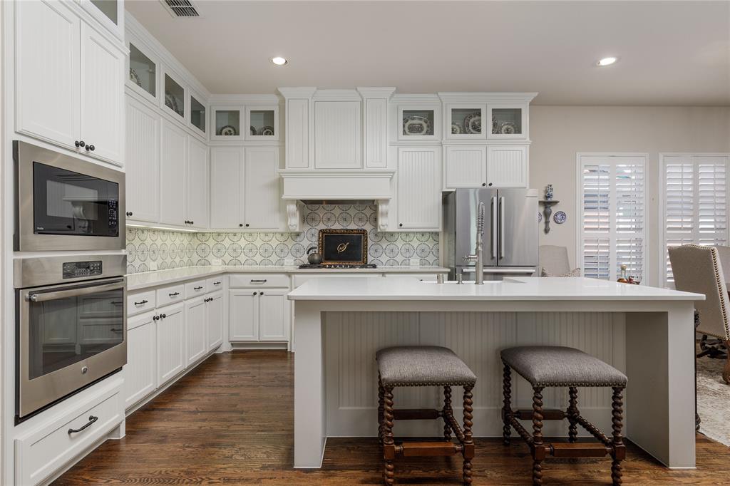 2500 Addison Street McKinney, TX 75071 - Photo 10 of 33 Kitchen is light and bright. Updated in 2024.