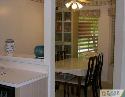 168 Nebula Road Piscataway, NJ 08854 - Photo 8 of 8 a view of a dining room with furniture and window
