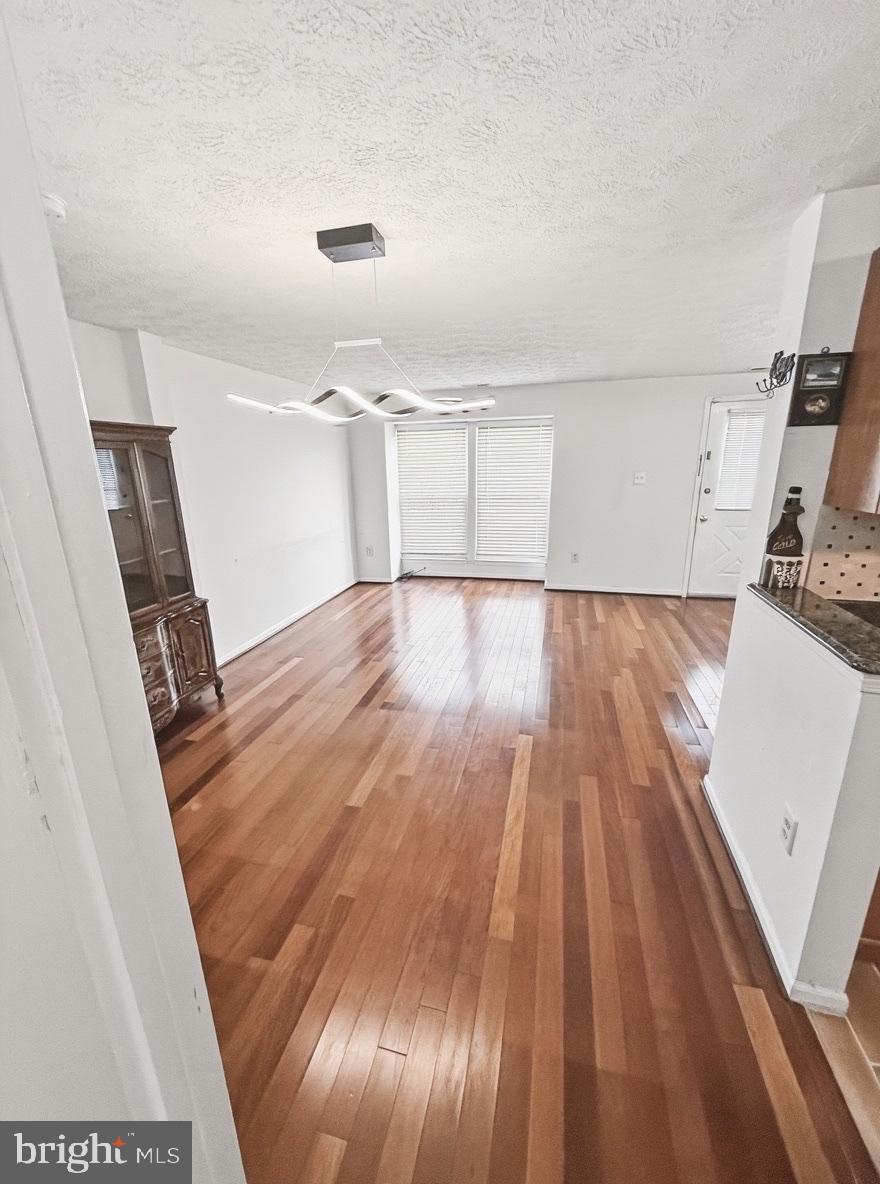 14106 Aldora Circle Silver Spring, MD 20904 - Photo 11 of 25 Spacious room with gleaming hardwood floors.