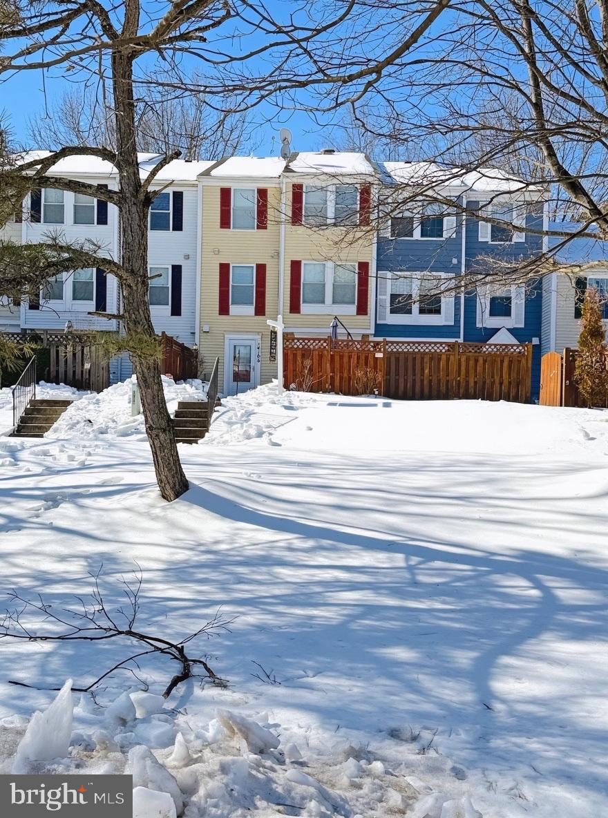 14106 Aldora Circle Silver Spring, MD 20904 - Photo 2 of 25 Charming townhomes nestled in winter's embrace.