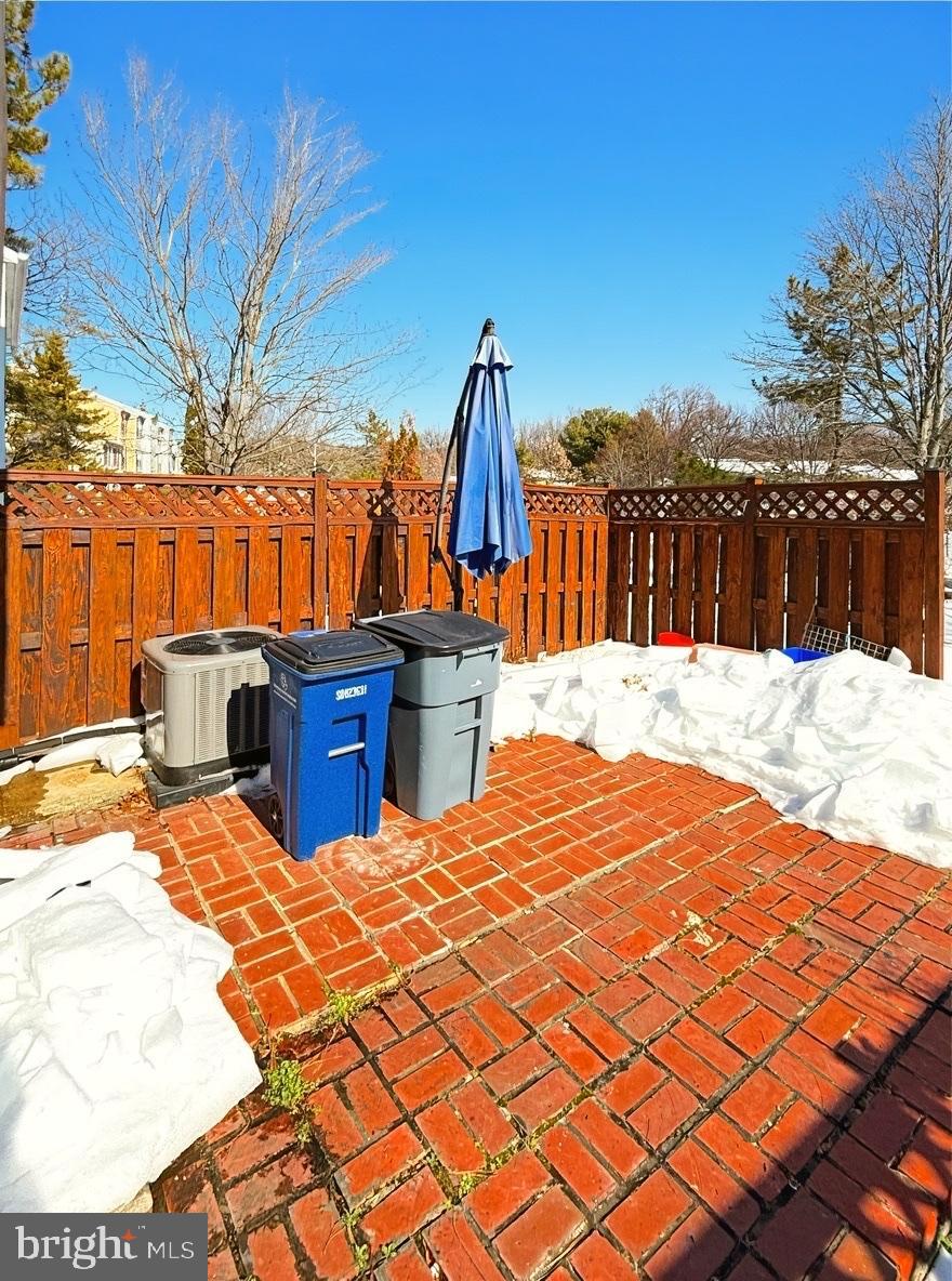 14106 Aldora Circle Silver Spring, MD 20904 - Photo 3 of 25 Sunny brick patio in the front of the home