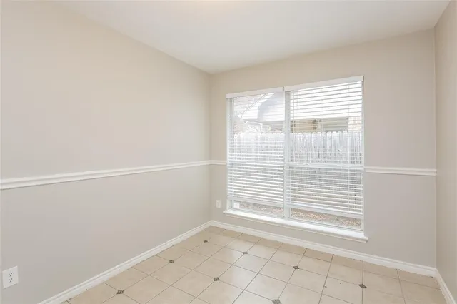 a view of a room that has a window in it