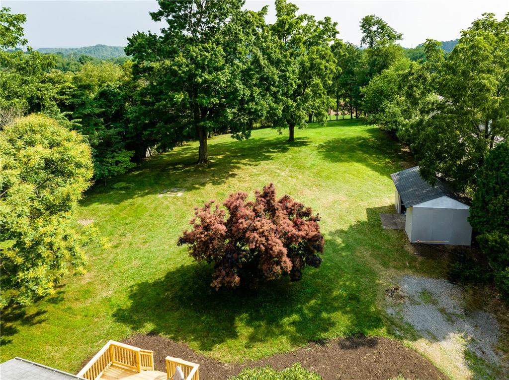 1929 Bakerstown Road Tarentum, PA 15084 - Photo 20 of 22 a view of a garden with a bench