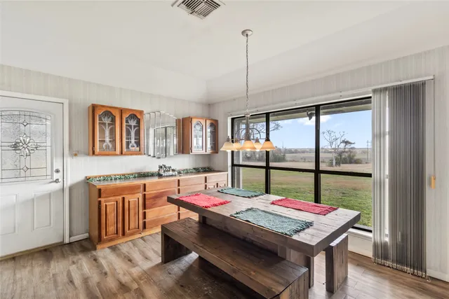 a table and a work place in a room