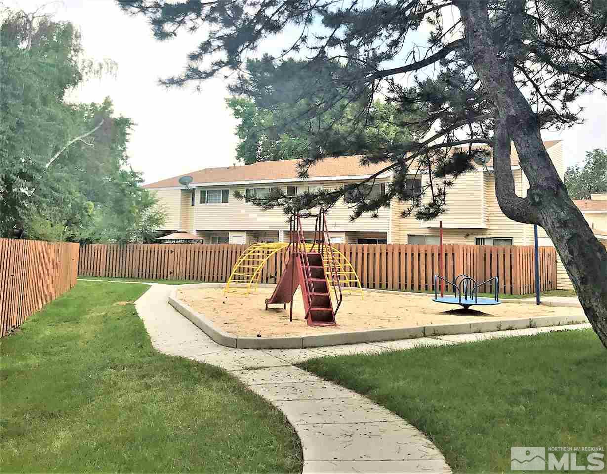 3551 Willow Reno, NV 89512 - Photo 15 of 15 a view of a deck with a big yard and large trees