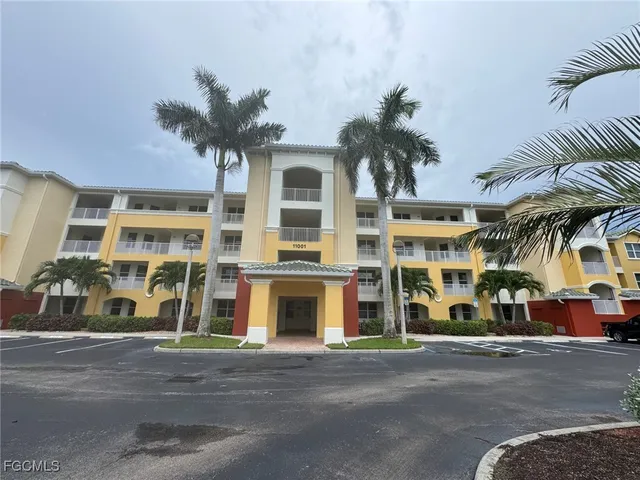 a view of a building with a street