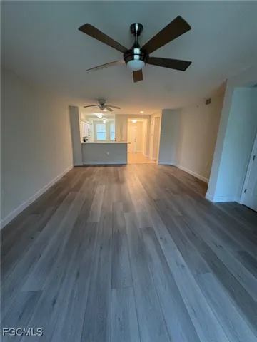 a view of a garden with an outdoor seating