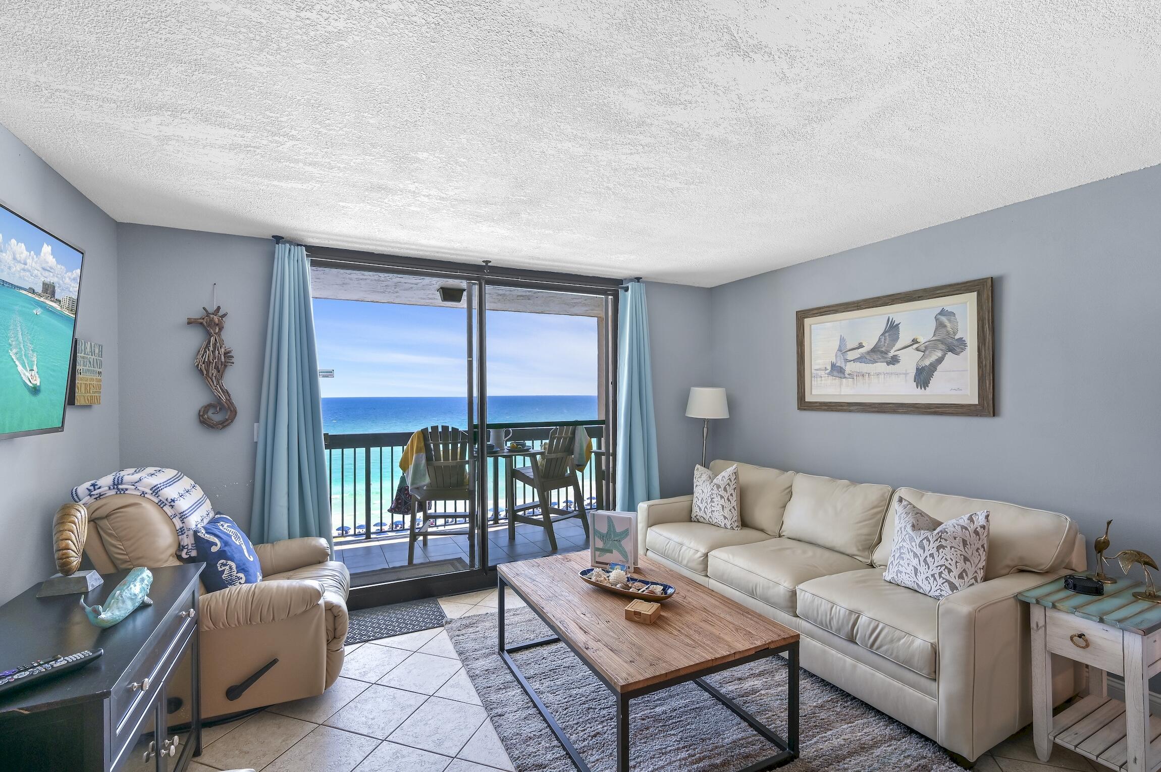 1040 Highway 98, Unit 802 Destin, FL 32541 - Photo 2 of 27 a living room with furniture and a floor to ceiling window