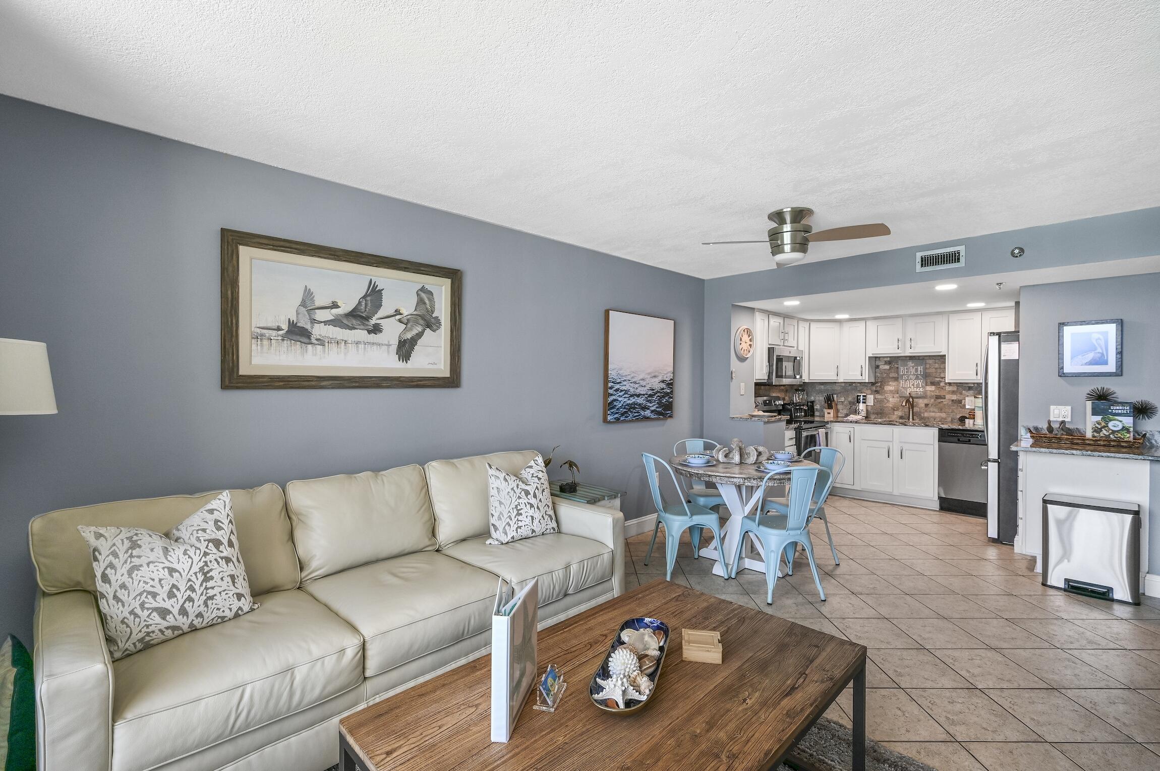1040 Highway 98, Unit 802 Destin, FL 32541 - Photo 6 of 27 a living room with furniture and a view of kitchen
