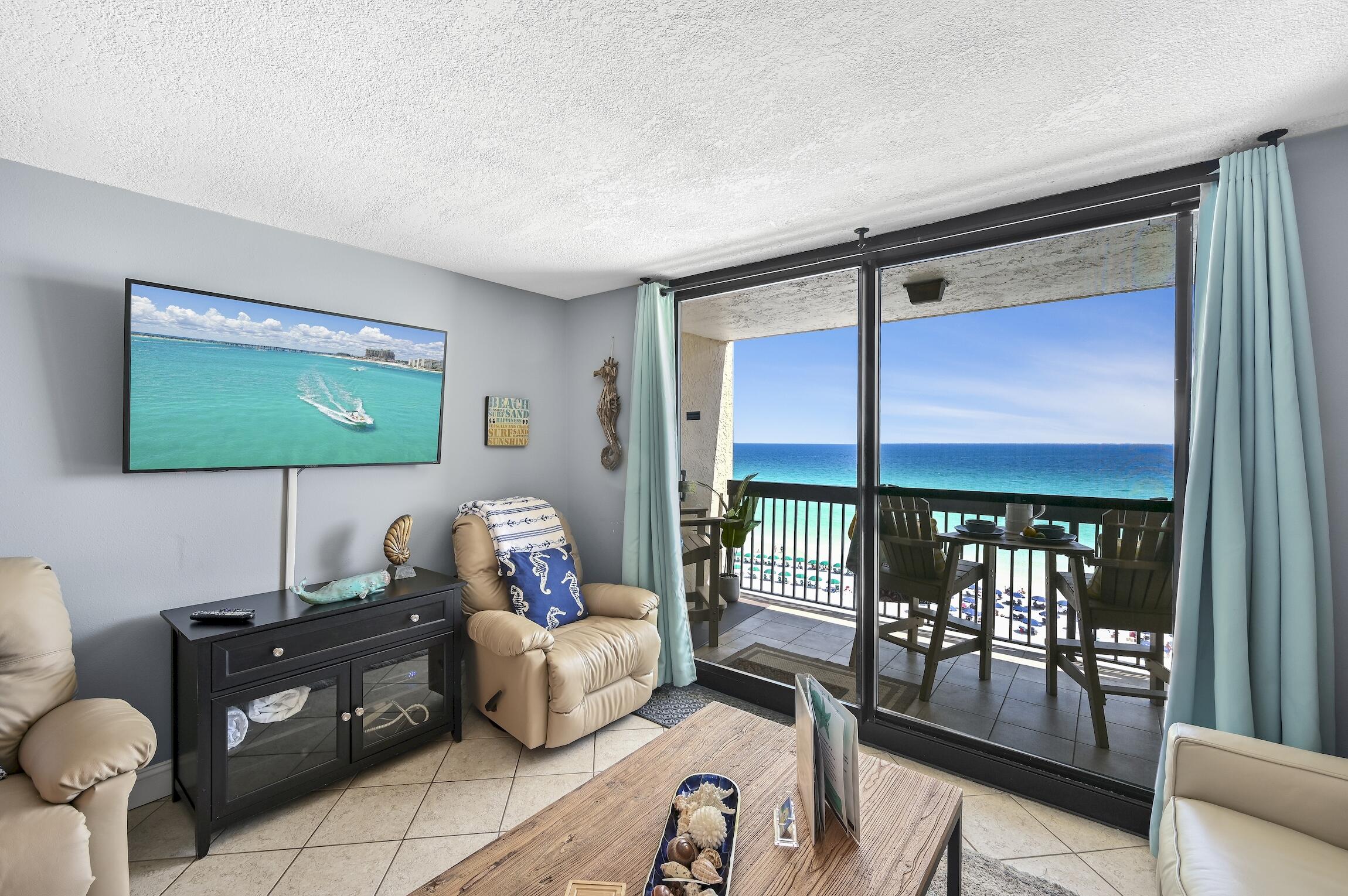 1040 Highway 98, Unit 802 Destin, FL 32541 - Photo 7 of 27 a living room with furniture and a flat screen tv