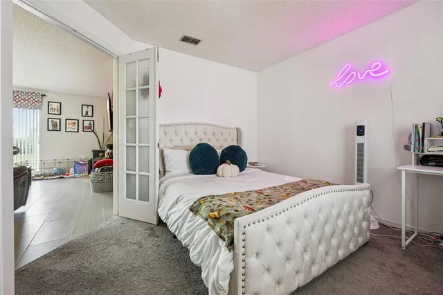 a bedroom with a bed and a bed