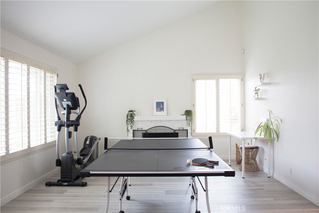 2052 South June Place Anaheim, CA 92802 - Photo 2 of 12 a view of a workspace with furniture and a window