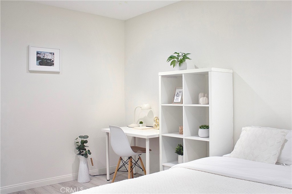 2052 South June Place Anaheim, CA 92802 - Photo 6 of 12 a bedroom with a bed and a table