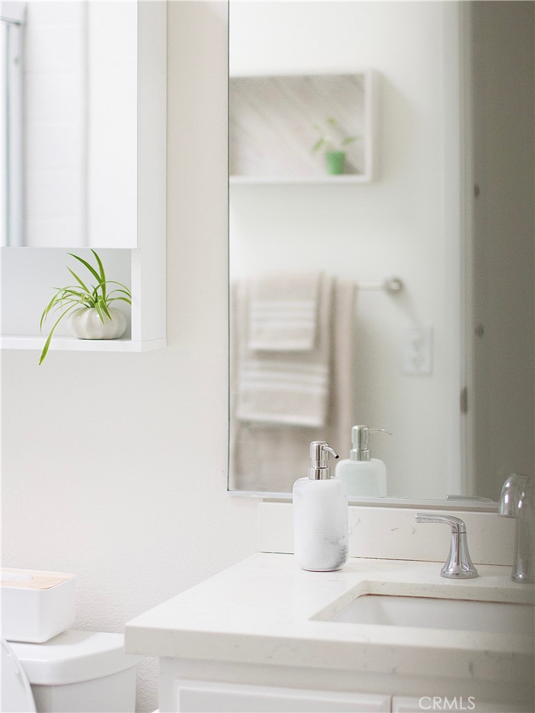 2052 South June Place Anaheim, CA 92802 - Photo 9 of 12 a bathroom with a sink and a bathtub