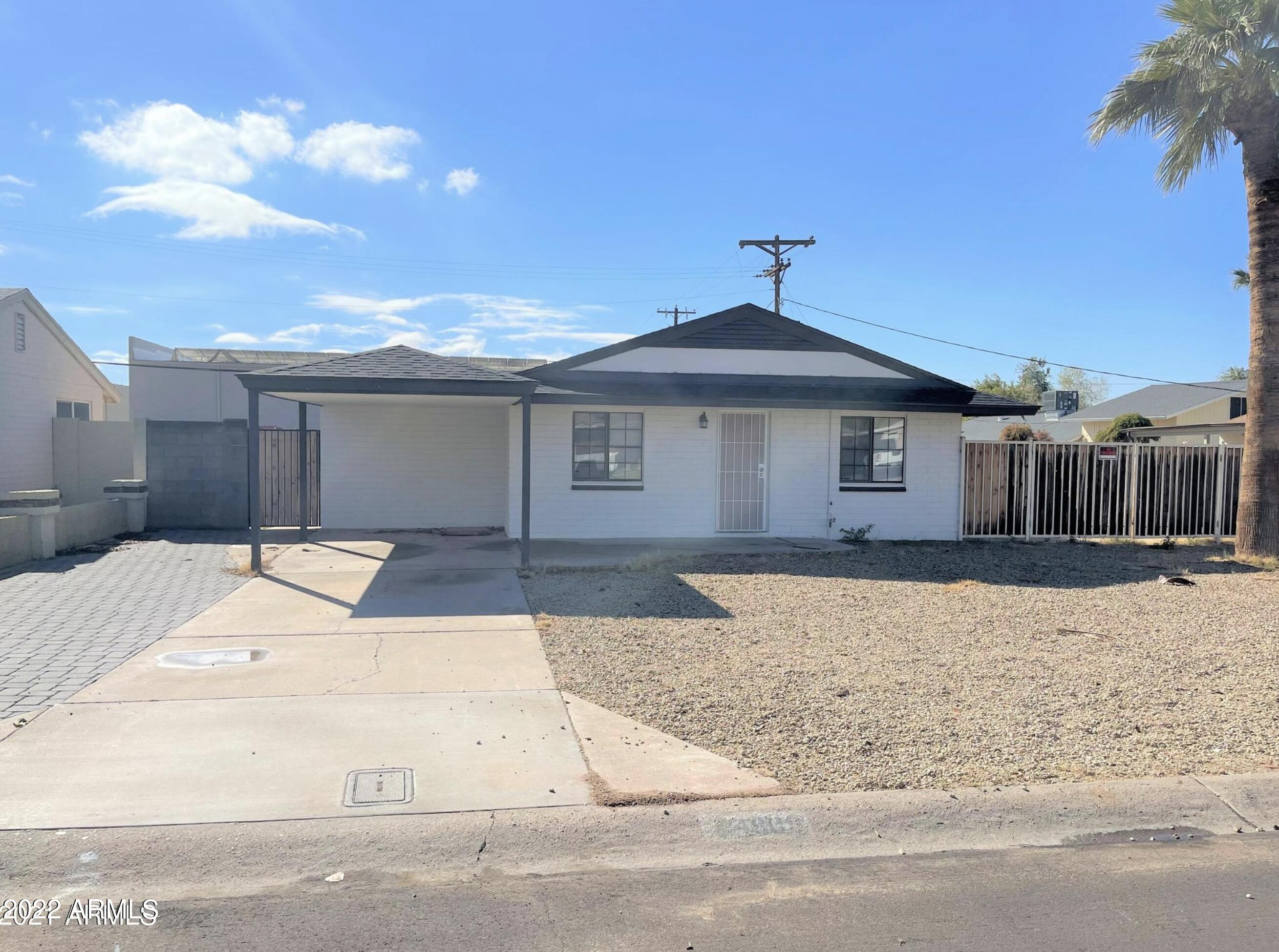 4609 East Almeria Road Phoenix, AZ 85008 - Photo 1 of 8 a front view of a house with a yard