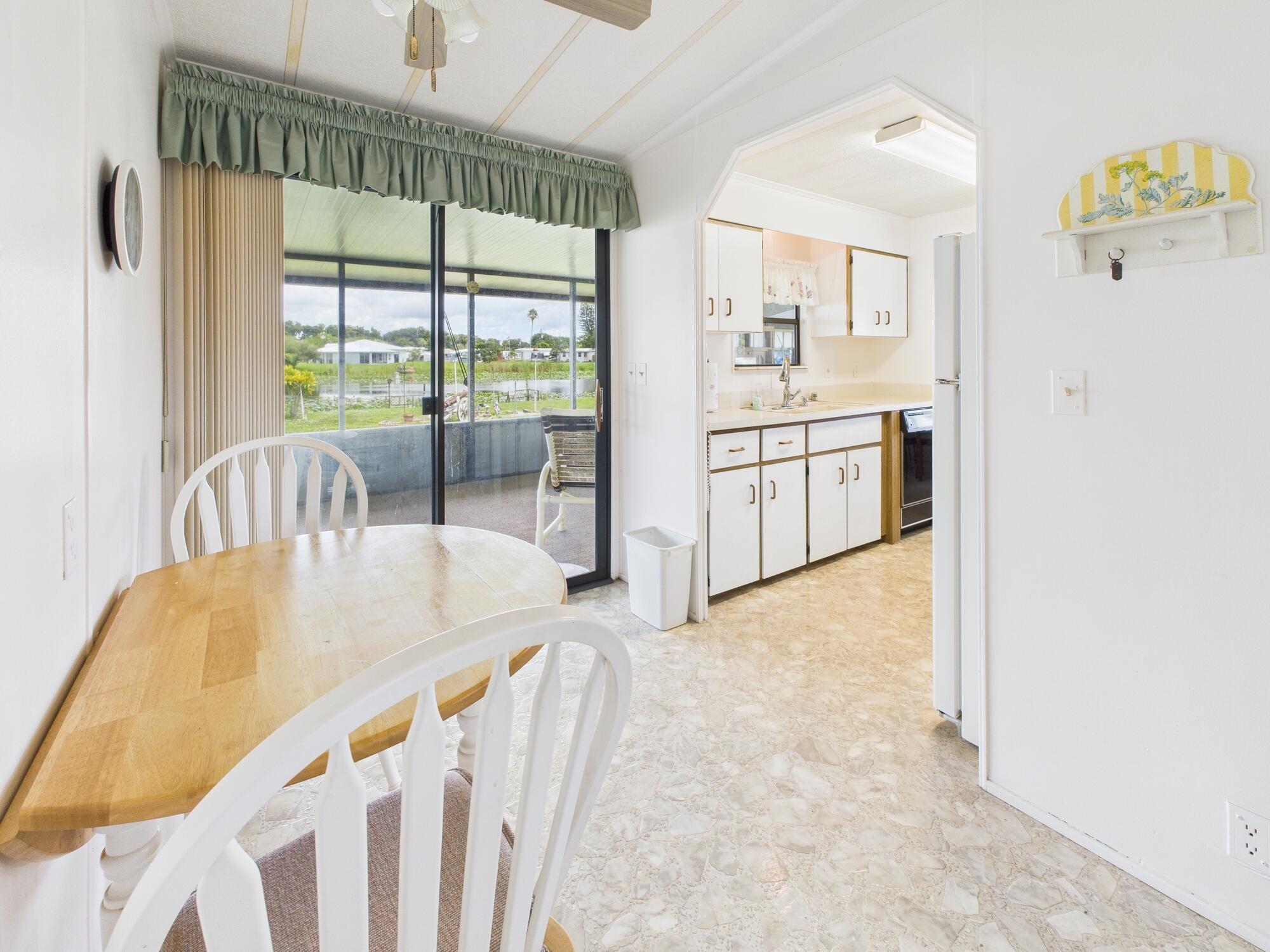 2001 Southeast 27th Street Okeechobee, FL 34974 - Photo 14 of 57 a view of a kitchen from the dinning room