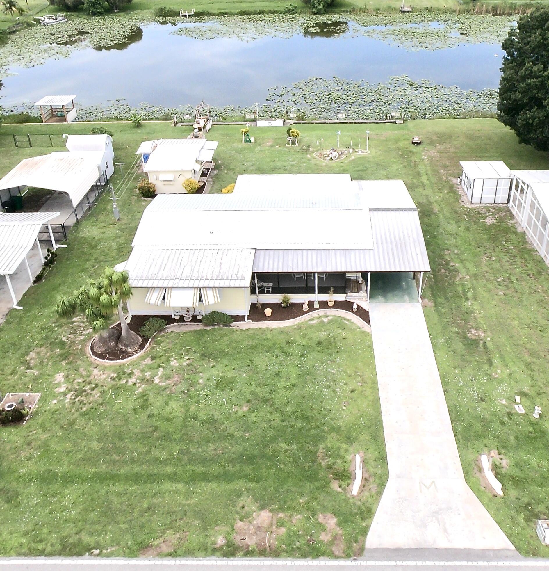 2001 Southeast 27th Street Okeechobee, FL 34974 - Photo 2 of 57 an aerial view of a house