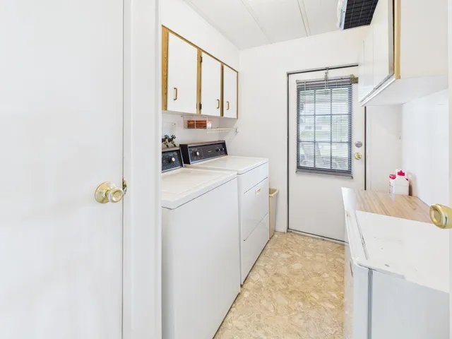 a living room with hardwood floor and a ceiling fan