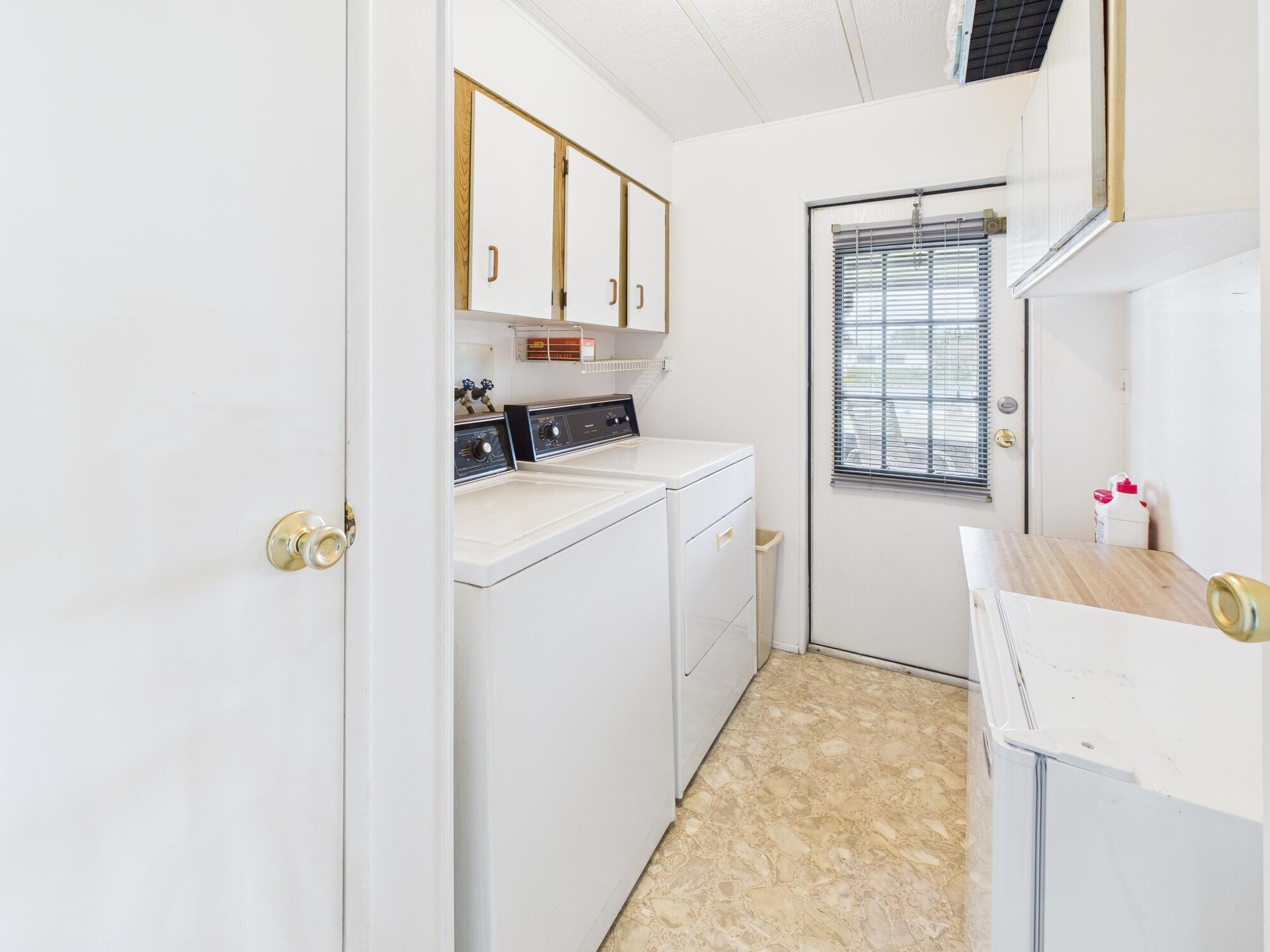 2001 Southeast 27th Street Okeechobee, FL 34974 - Photo 24 of 57 a room that has a bed and a window in it