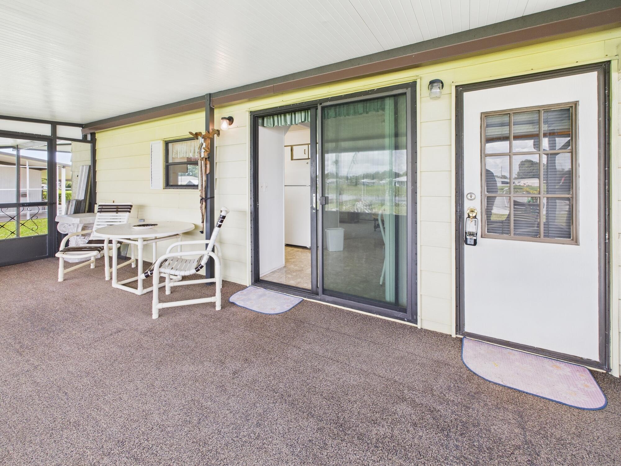2001 Southeast 27th Street Okeechobee, FL 34974 - Photo 44 of 57 a view of a livingroom with furniture and a window