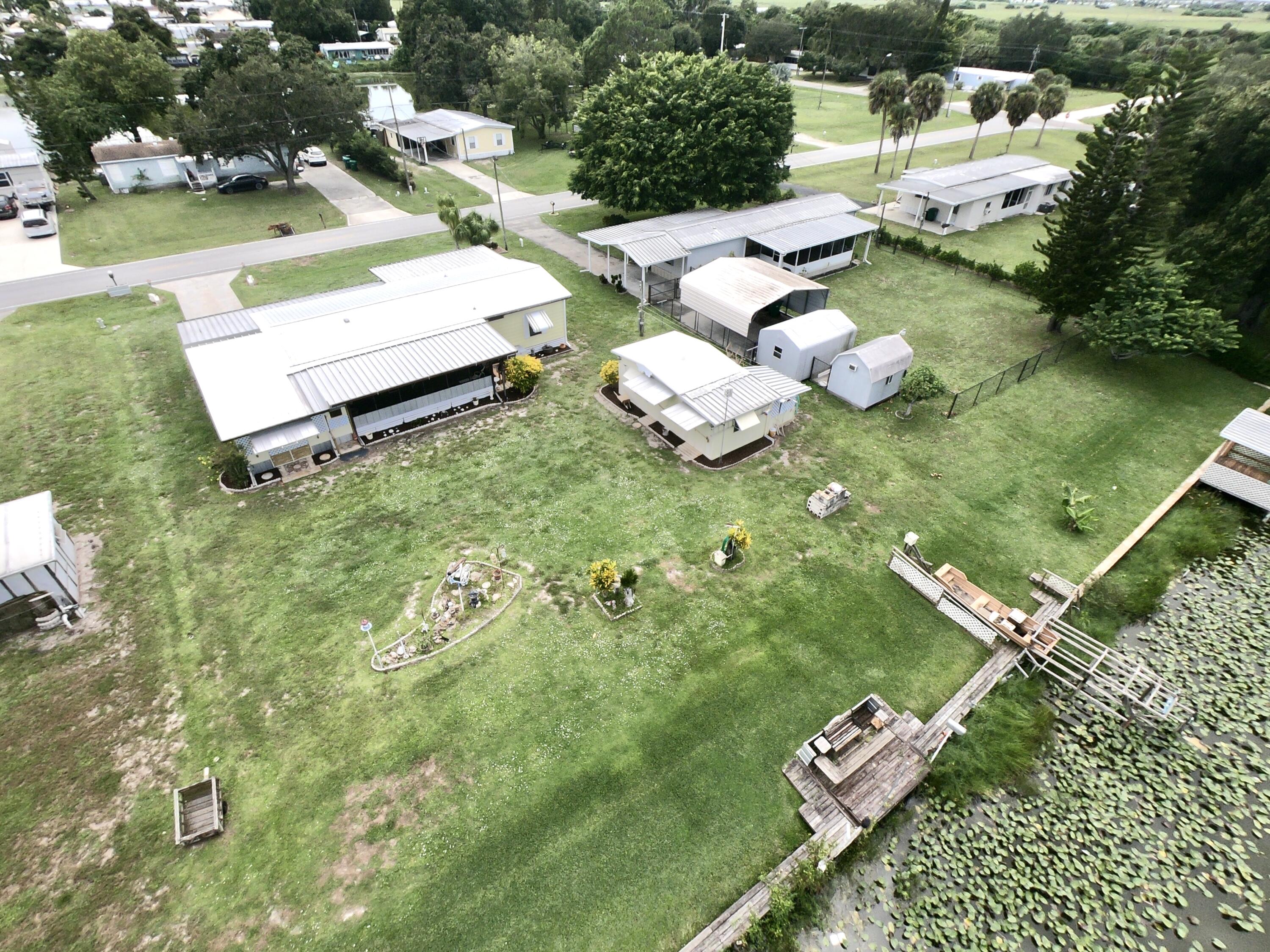 2001 Southeast 27th Street Okeechobee, FL 34974 - Photo 54 of 57 a view of a golf course with chairs