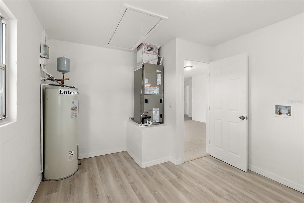 145 Oak Ridge Avenue Edgewater, FL 32132 - Photo 23 of 32 a view of a storage & utility room with closet