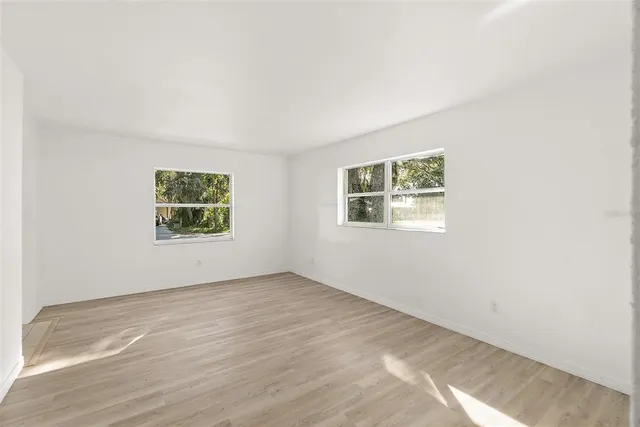 an empty room with windows