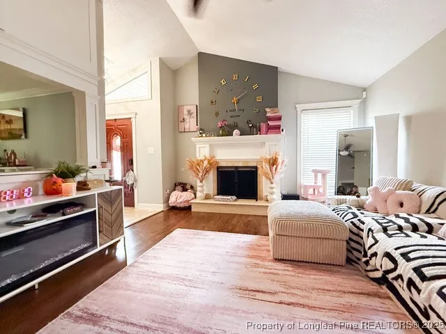 a bedroom with a bed and a fireplace