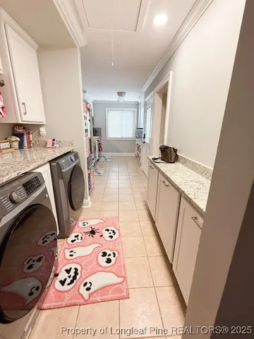 a kitchen with granite countertop a sink a stove and refrigerator