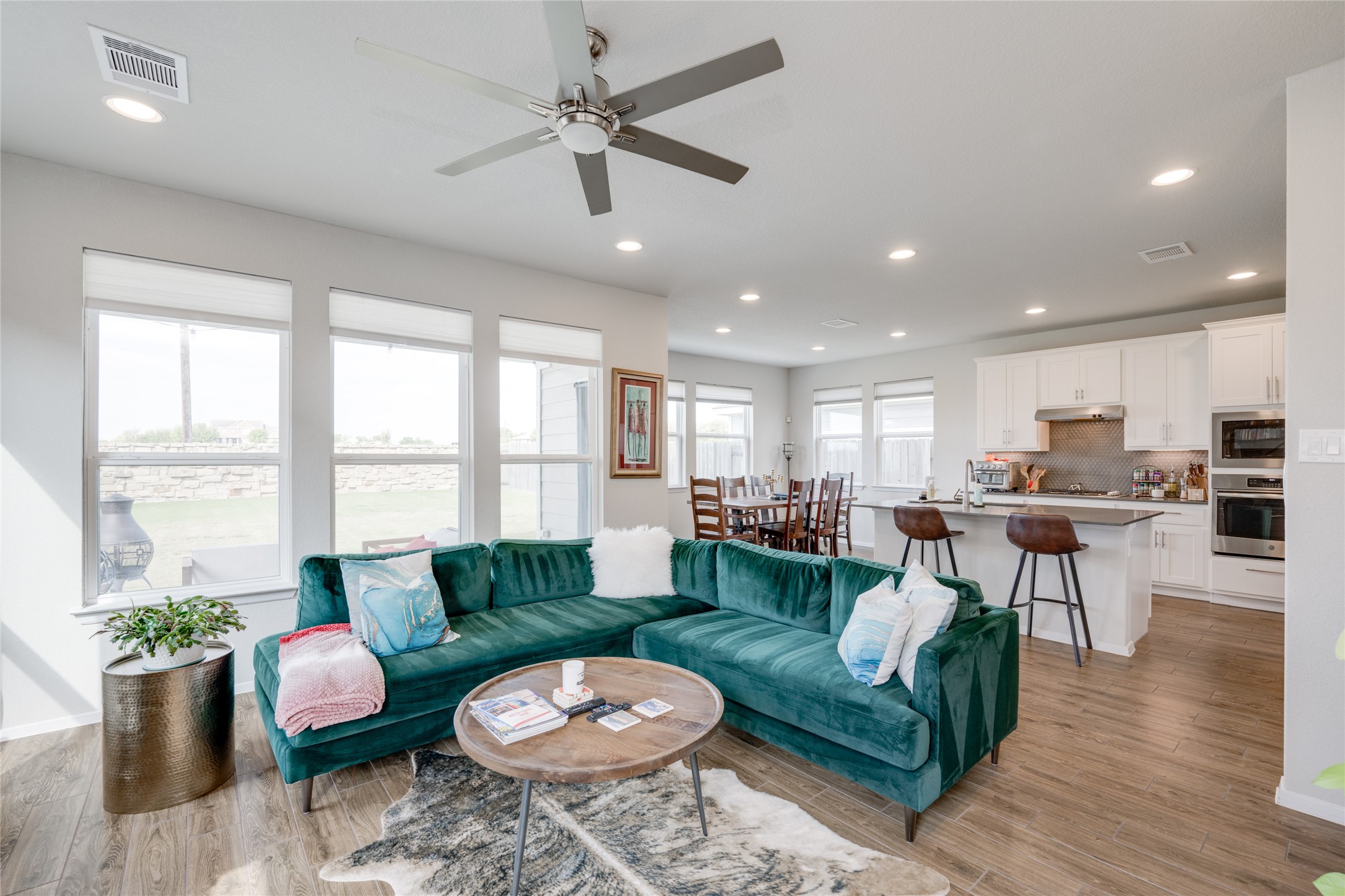 7948 Castelardo Place Round Rock, TX 78665 - Photo 6 of 32 a living room with furniture and a large window