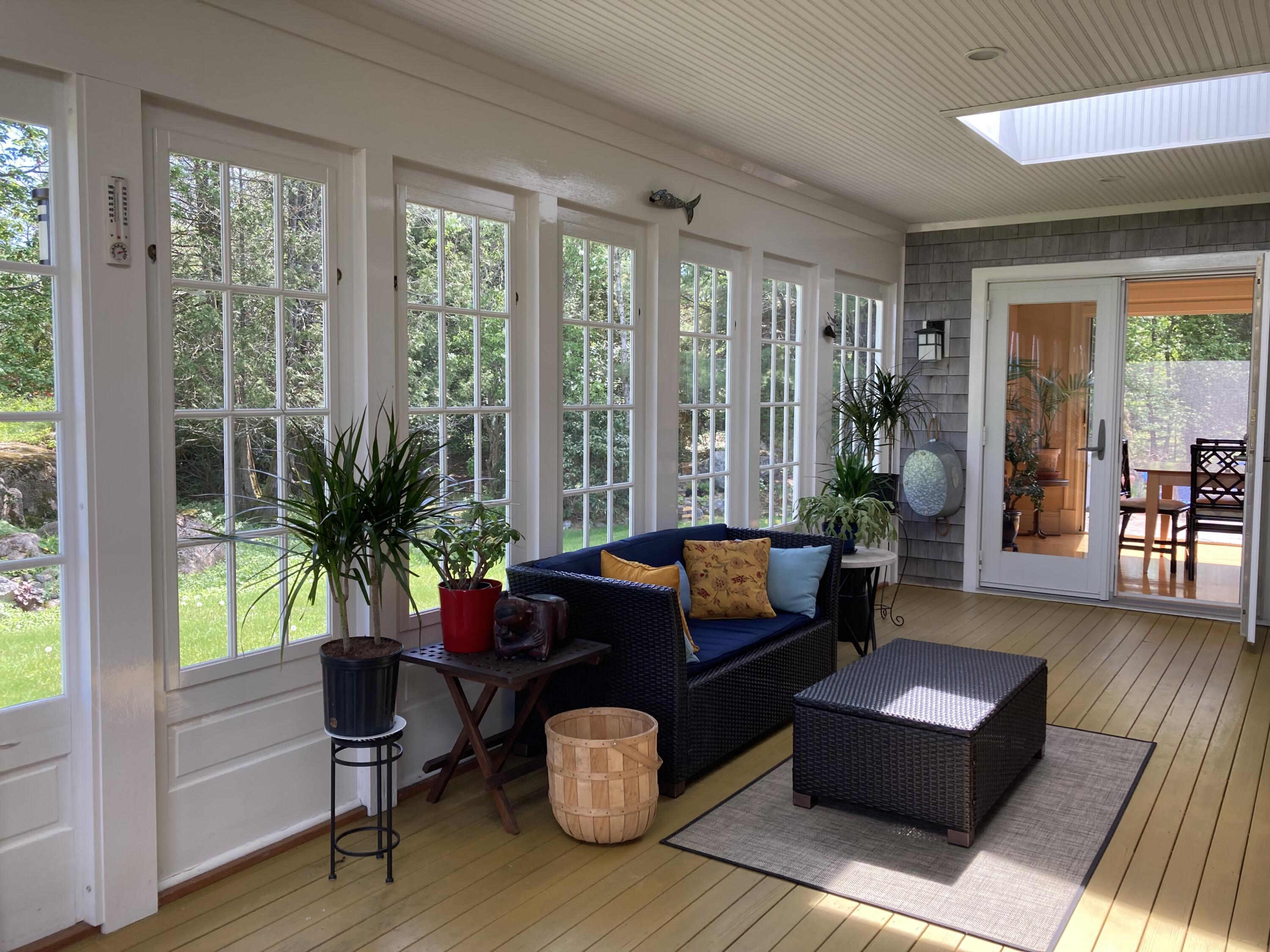 635 Corea Road Corea, ME 04624 - Photo 6 of 35 From glassed-in porch to great room.