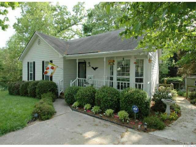 2105 Bufflehead Road Raleigh, NC 27616 - Photo 1 of 12 a front view of a house with a yard