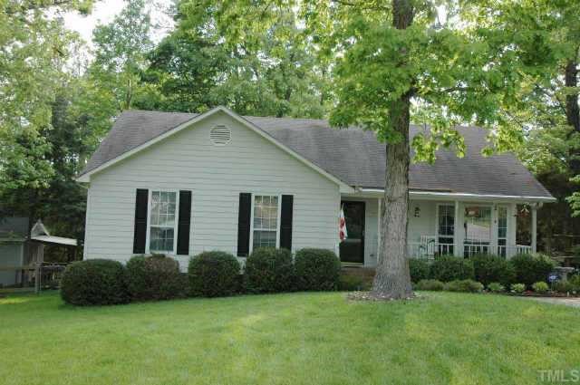 2105 Bufflehead Road Raleigh, NC 27616 - Photo 2 of 12 a front view of a house with a garden